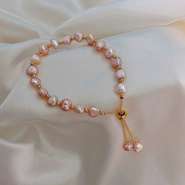 Vintage roze parelarmband