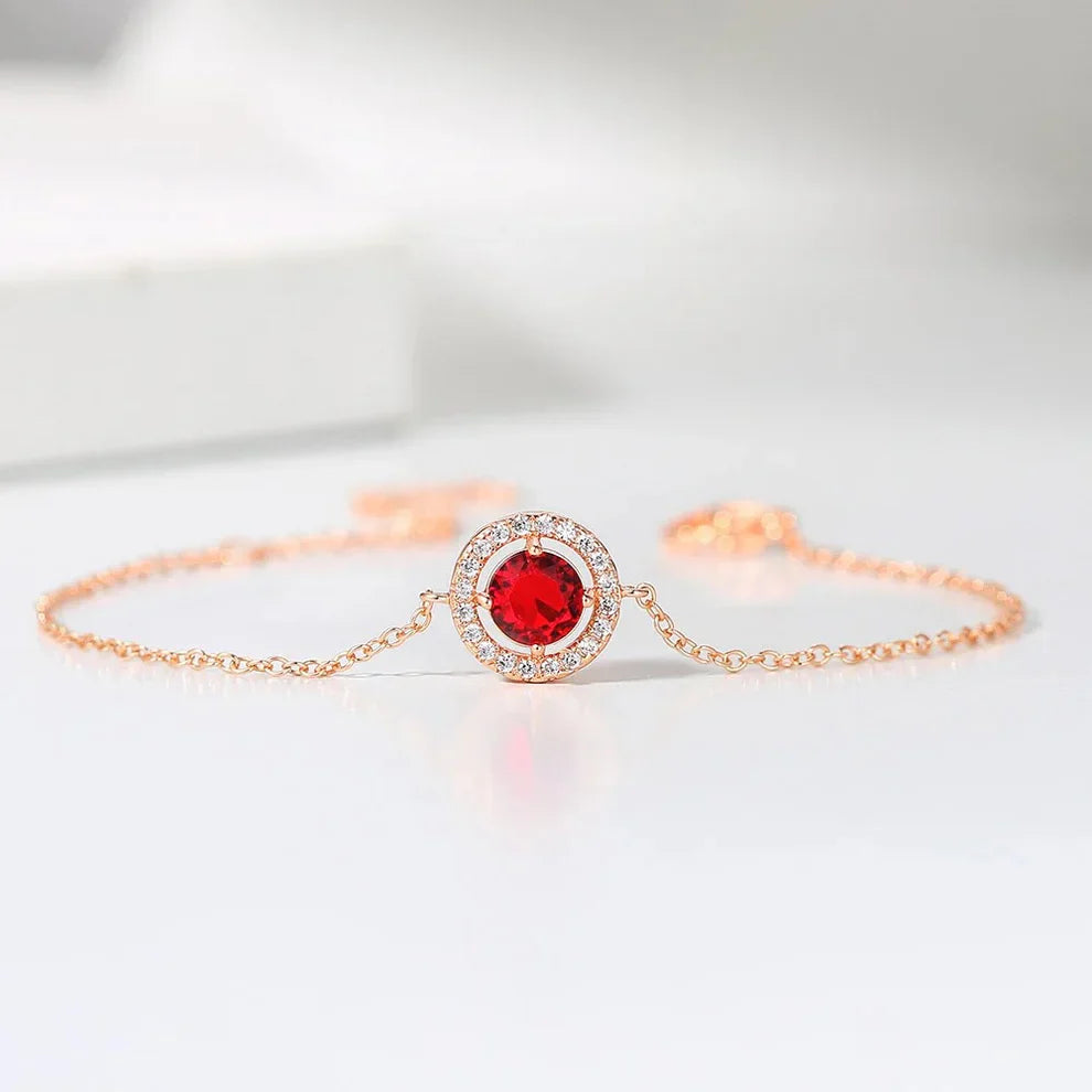 Klassieke roze armband met rode stenen en kristallen