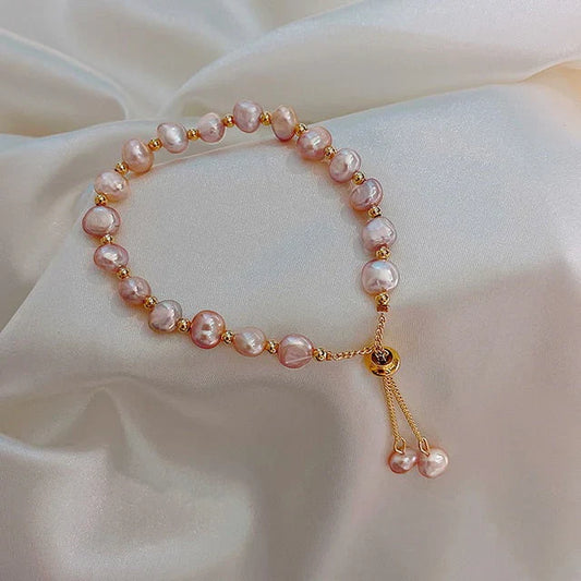 Vintage roze parelarmband