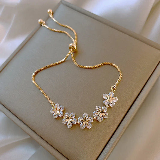 Gouden madeliefjesarmband
