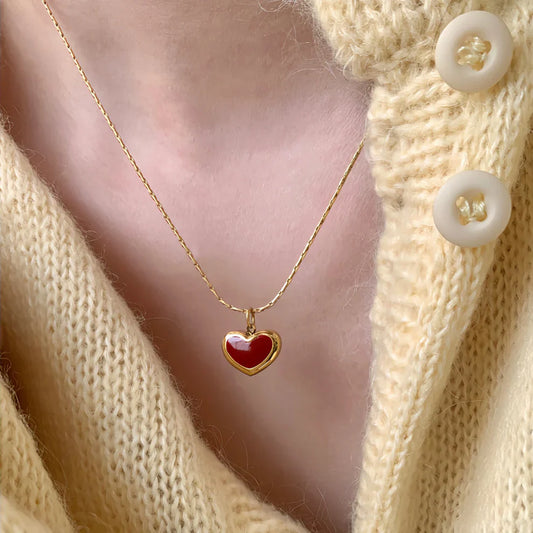 Schattige rode hartketting