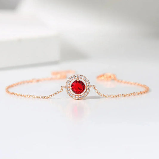 Klassieke roze armband met rode stenen en kristallen
